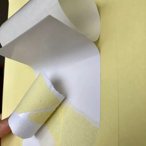 Coated adhesive paper for tire glue